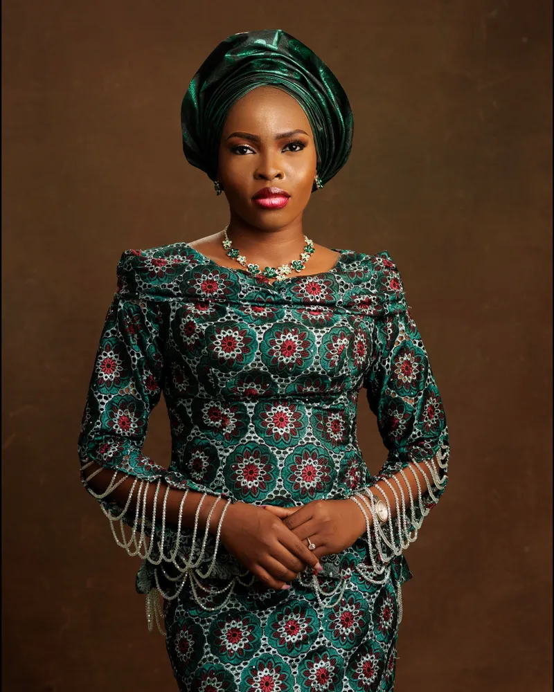 Opeyemi in her emerald bridal attire