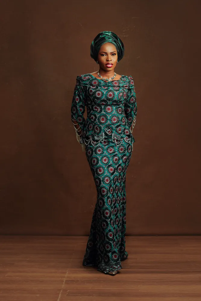 Opeyemi in her emerald bridal attire